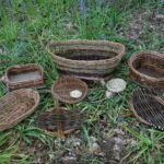 A huge range of baskets, plank baskets, coil baskets, oval baskets, tension platters, made with willow, made with rushes, all made by hand.