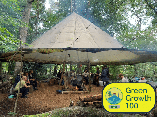 Image of South London Woods base camp during a foraging course - with Green Growth 100 award in the corner